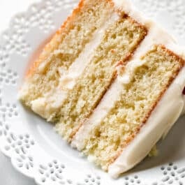 Vanilla cake slice on white plate