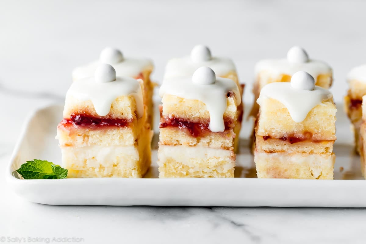 Lemon berry petit fours on white serving plate