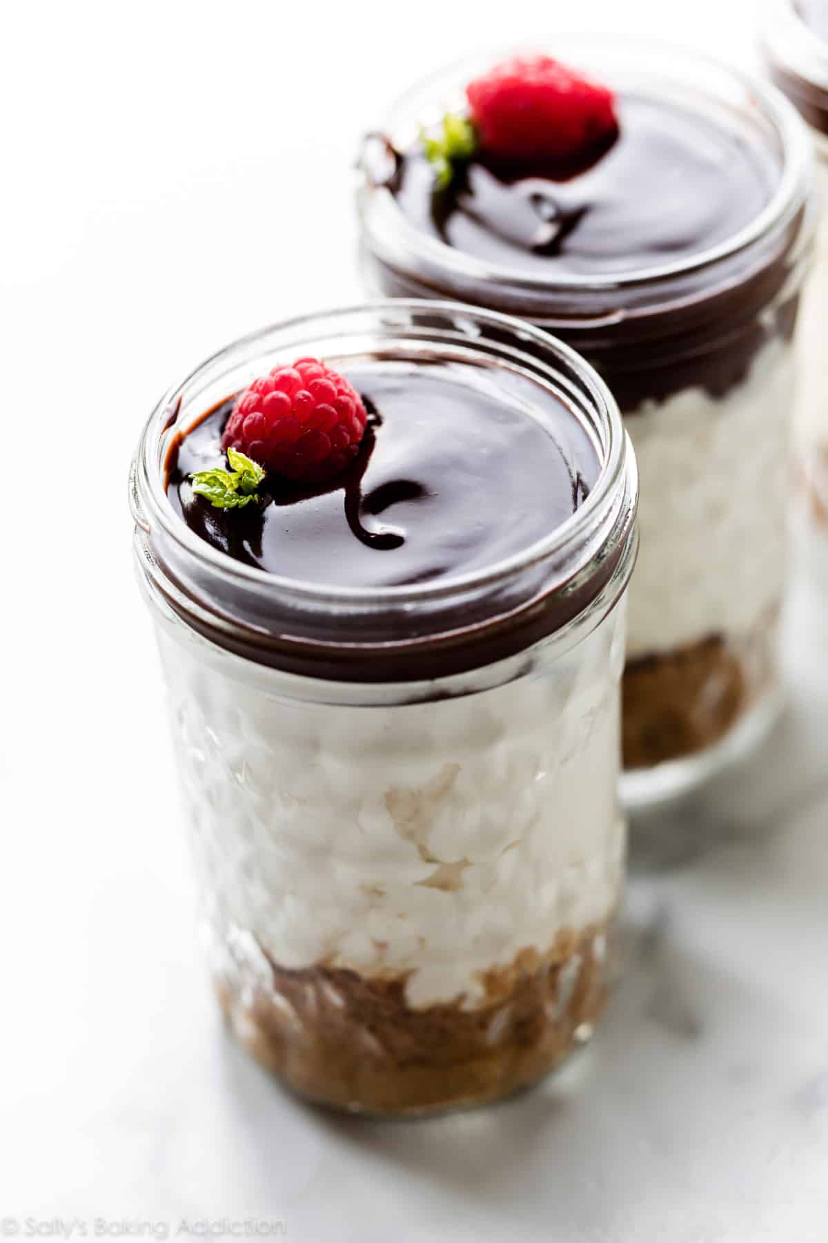 no bake cheesecake jars with chocolate ganache topping