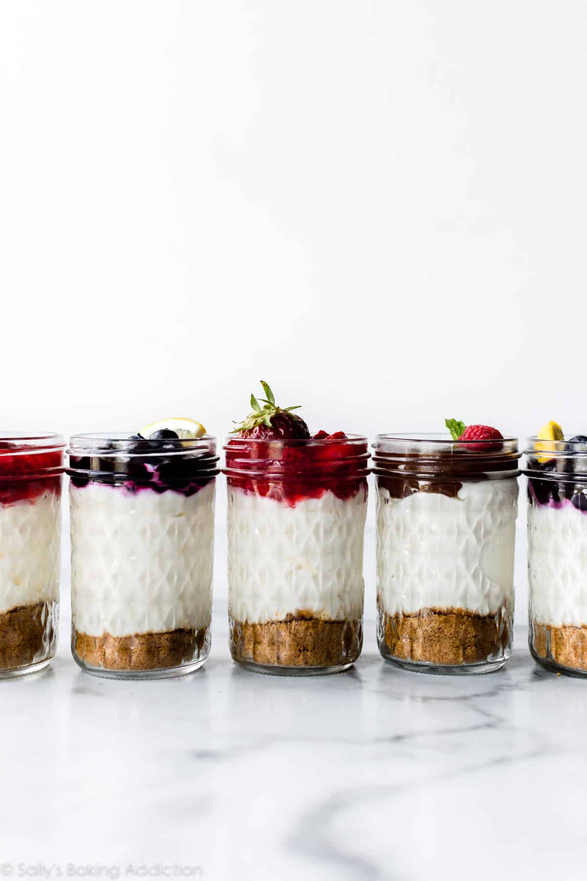 row of no bake cheesecake jars