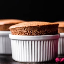 chocolate soufflé in white ramekin