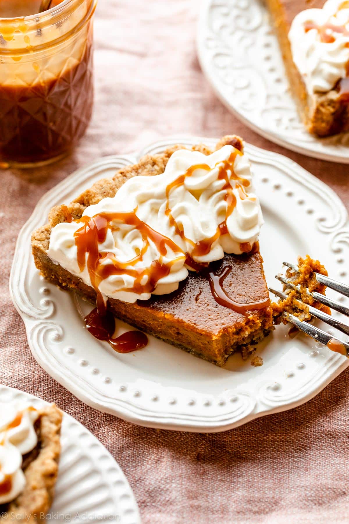 slice of pumpkin tart on white plate