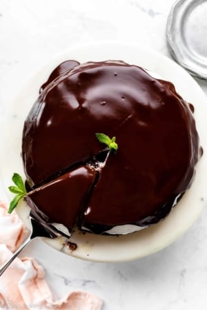 top of a ganache frosted chocolate cake