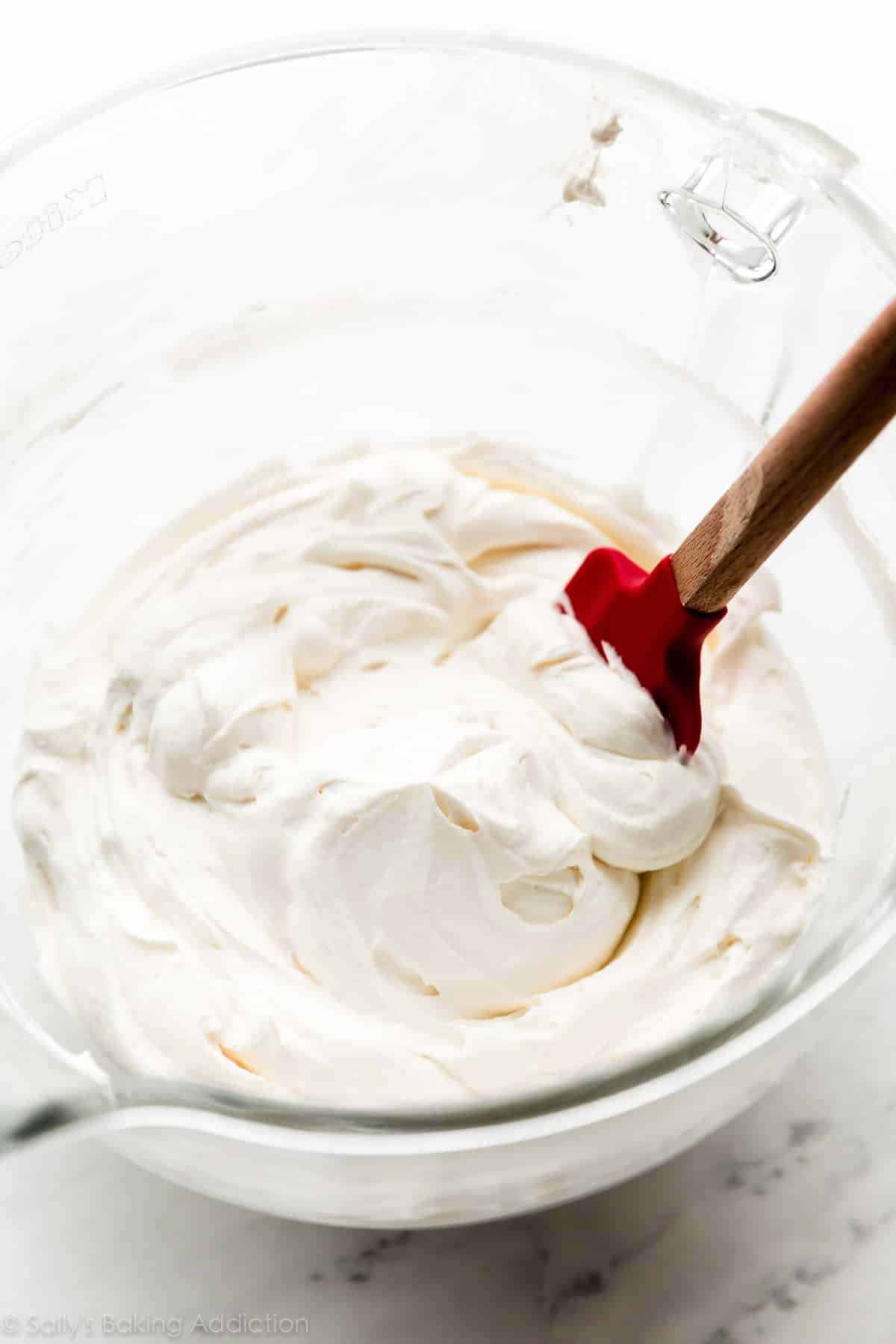 whipped frosting in mixing bowl