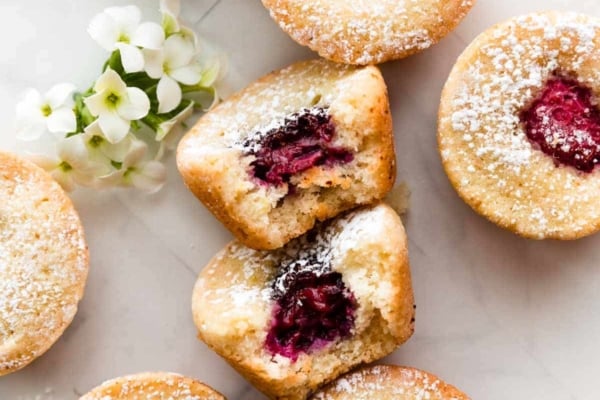 brown butter tea cakes with raspberries and blackberries in center