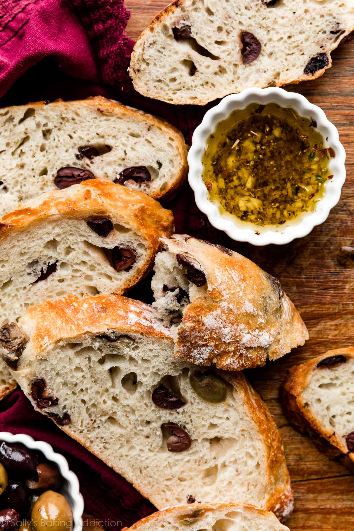 slices of olive bread with garlic dipping oil