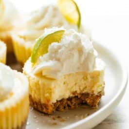 mini margarita cheesecakes with tequila whipped cream.