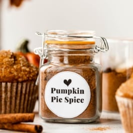 small jar of pumpkin pie spice with white label on the front.