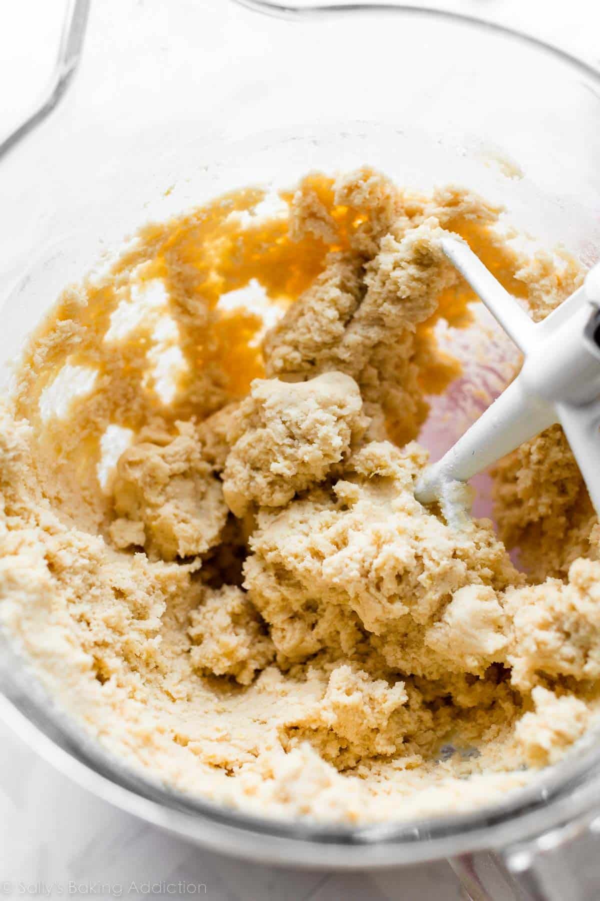 lemon cookie dough in glass bowl.