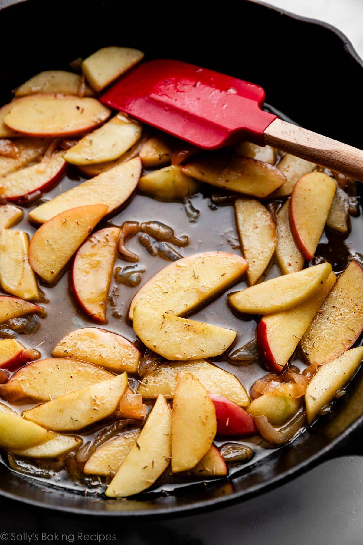 apples in sauce in skillet.