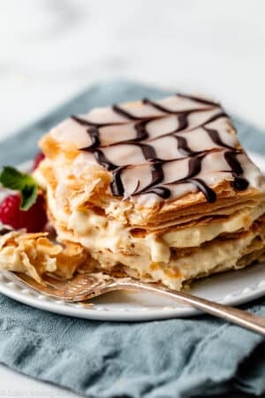 mille feuille with pastry cream filling and chevron-style icing and chocolate on top.