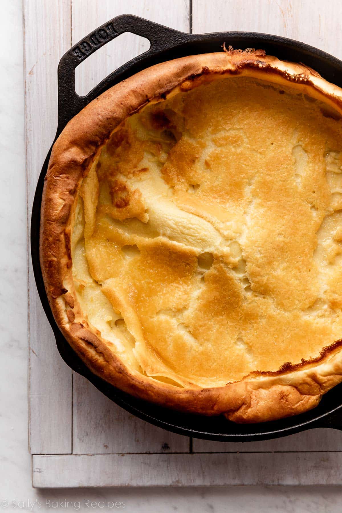 dutch baby pancake in skillet without any toppings.